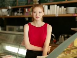  MS Portrait of a teenage girl working in a cafÃƒÂ©. Stock Footage