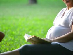 Mother and children relaxing outdoor Stock Footage