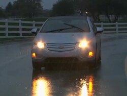 WS POV Electric car passing through countryside in rain / Rochester, Michigan, United States Stock Footage
