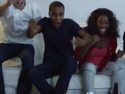 Young Adults watching Superbowl Stock Footage