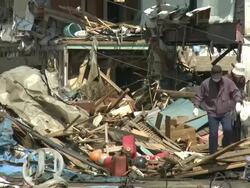 Destruction in Kesennuma City, a traditional fishing town in N E Japan filmed on 1 April 2011, 3 weeks after a tsunami which was caused by magnitude 9 Tohoku earthquake off north east Japan / AUDIO Stock Footage