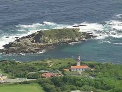 MS AERIAL Shot of light house at cost / Basque Country, France Stock Footage