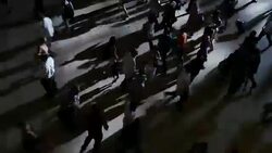 business people commuting on crowded street in the city. new york rush hour scene of anonymous pedestrians walking Stock Footage
