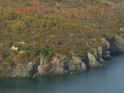 WS ARIEAL View of Rocky sea coast / Maine, United States Stock Footage