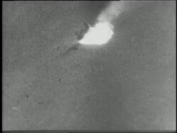 U.S. military planes shoot artillery and drop bombs over targets in World War II. News Clip