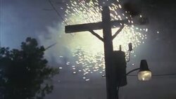 Sparks fly from a power line during a tornado. Stock Footage