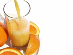 Pouring glass of orange juice Stock Footage