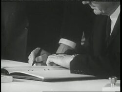 Dean Rusk and Andrei Gromyko sign nuclear test-ban treaty. News Clip