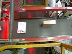 MS Parcels are sorted on conveyor belt in FedEx Depot / Memphis, Tennessee, United States Stock Footage