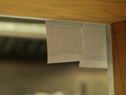 Male chef organising food orders in commercial kitchen Stock Footage