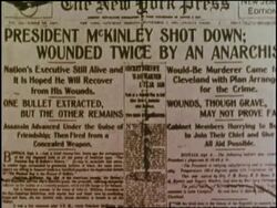 A newspaper headline announces the assassination of U.S. President William McKinley. Stock Footage