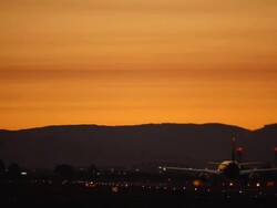 airplane taking off in sunset Stock Footage