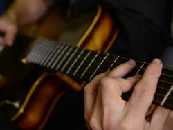 Craftsman 'Luthier' Nigel Forster making hand made Guitars Stock Footage