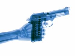 Blue X-ray hand firing gun quickly Stock Footage