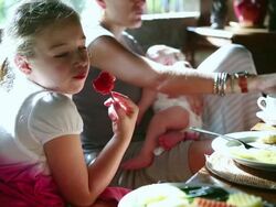 MS Shot of mother and children having breakfast on porch / Ubud, Bali, Indonesia Stock Footage