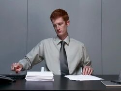 Time lapse medium shot office worker stamping documents / looking at CAM with bored expression / falling asleep Stock Footage