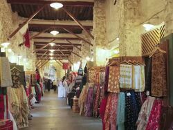 MS T/L Mud render shops of cloths  / Doha, Qatar Stock Footage