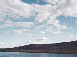 WS View of river with power lines / Zillah, Washington, USA  Stock Footage