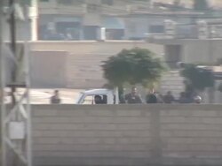 Track pickup truck with armed Syrian rebels at border with Turkey Stock Footage