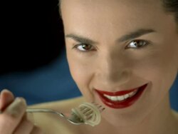 HD Super Slow-Mo: Happy Young Woman Eating Spaghetti Stock Footage