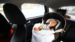 HD:Portrait of little baby sitting in safety carseat. Stock Footage