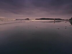 WS POV SLO MO Woman running on Beach / Bandon, Oregon, United States Stock Footage