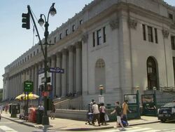Pan to the front of the Landmark Post Office on 8th and 33rd street. Stock Footage