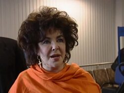 Liz Taylor talks about the 'excitement' of being made a Dame as she arrives at Heathrow Stock Footage