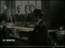 1933: JAPAN LEAVES LEAGUE OF NATIONS: 'Geneva' superimposed over Palais des Nations building, Japanese Foreign Minister Yosuke Matsuoka speaking, SOT 'Matter of common knowledge...guarantee peace...by assembly.' TRACKING Matsuoka walking out of meeting. Instructional Video