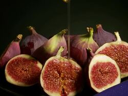 MS ZO Shot of figs on plate / Estepona,Espana, Malaga, Spain   Stock Footage