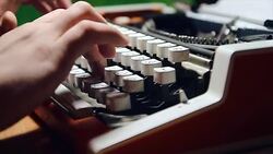 Male human hands write with an old fashion typewriter machine Stock Footage
