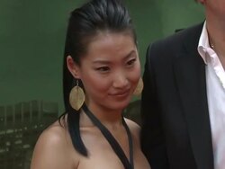 Alice Kim and Nicolas Cage at the 'The Sorcerer's Apprentice' New York Premiere - Arrivals  Stock Footage