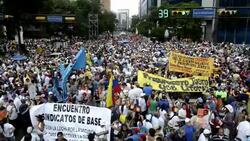 CLEAN : Rival May Day rallies take News Clip