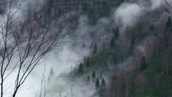 View of misty mountain scenery early in the morning. Stock Footage