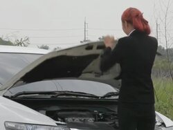 Woman with car broke down Stock Footage