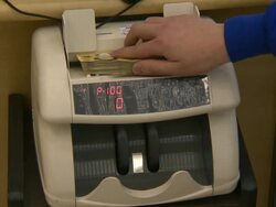 The automatic machine counting a fifty thousand won in notes Stock Footage