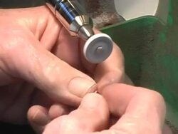 Smoothing Gold Crown Stock Footage