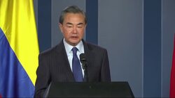 China's Yi congratulates Santos in Colombia Instructional Video