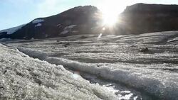 Sunlight and Mountain Glacier Melting Stock Footage