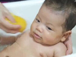Baby taking a bath Stock Footage