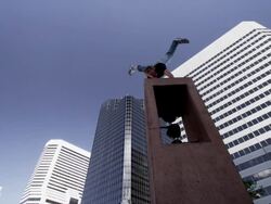 WS SLO MO Man performs handstand on urban sculpture / Denver, Colorado, United States Stock Footage