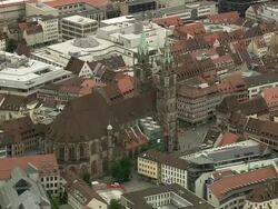 AERIAL St. Lorenz Cathedral in old town, Nuremberg, Bavaria, Germany Stock Footage