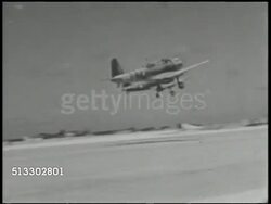 1942: MIDWAY ISLAND U.S. AIR BASE:  VS Various United States Navy fighter airplanes, including Douglas SBD Dauntless dive bombers & B-17 Flying Fortress bombers, taking off from Midway Island air base. Battle of Midway, World War II, WWII, Pacific Instructional Video
