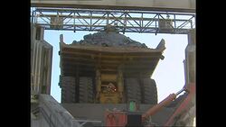 Rock being crushed at a diamond mine News Clip