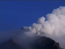 Villagers return to their homes along the ash-covered slopes News Clip