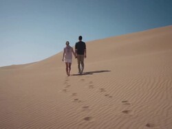 Couple in desert Stock Footage