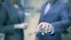 Business People-Hand Touching Tablet Computer Screen With Copy Space. Shallow DOF. Stock Footage