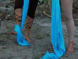 MS TU TD Foot demonstration of how to wrap fabric around foot to perform aerial dance / Montezuma, Puntarenas, Costa Rica Stock Footage