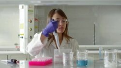 MS Female scientist using multichannel pipettor to transfer solution in research lab Stock Footage