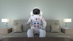Astronaut Sitting On Couch Watching TV Stock Footage